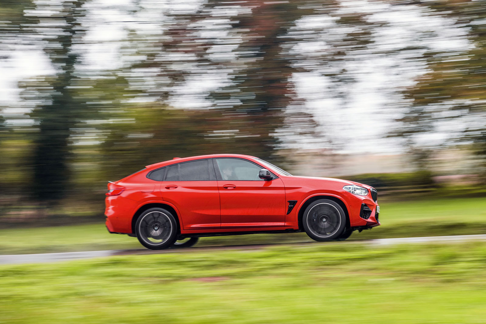 BMW X4 M Competition 2019 road test review - hero side